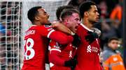 Liverpool recovered from a first-half setback to comfortably defeat Luton