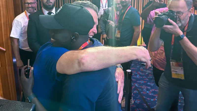 Netherlands coach Van Gaal hugs reporter at World Cup Netherlands coach Van Gaal hugs reporter at World Cup