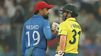 AUS vs AFG मैच में गर्माया माहौल, राशिद-वॉर्नर में हुई तकरार, एकदूसरे को सुनाया फिर अजमत और मार्श भिड़े - AUS vs AFG मैच में गर्माया माहौल, राशिद-वॉर्नर में हुई तकरार, एकदूसरे को सुनाया फिर अजमत और मार्श भिड़े