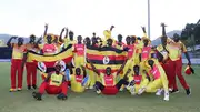 The Uganga cricket team celebrate a victory for their side. 