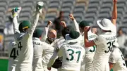 Australian players celebrate after beating Pakistan by 360 runs in the first Test on December 17. (Getty)