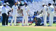 Indian players and umpires at Newlands, Cape Town as groundsman does repair work (Getty Images)