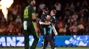 New Zealand's Daryl Mitchell (L) and Glenn Phillips celebrate their win in the 4th T20I against Pakistan at Hagley Oval on January 19. (Getty)