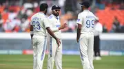 India captain Rohit Sharma talking with teammates Jasprit Bumrah and Ravichandran Ashwin.