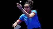 Manika Batra of Team India competes in the group match against Wang Manyu of Team China. (Getty Images)