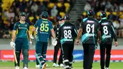 Australia's Mitchell Marsh (left) and Tim David (2nd from left) talk during first T20I against New Zealand at Sky Stadium on February 21 in Wellington. (Getty)