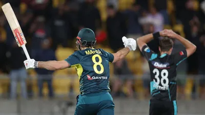 NZ vs AUS, T20I : ऋषभ पंत की टीम के 6.50 करोड़ वाले बैटर ने उड़ाए 7 छक्के, 216 रनों के चेज का खिलौना बनाकर ऑस्ट्रेलिया को न्यूजीलैंड पर दिलाई 6 विकेट से जीत  - Mitchell marsh tim david power hitting australia won 1st t20i by 6 wicket vs new zealand nz vs aus