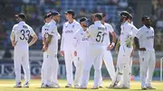 England players stand in a huddle in this frame. (Getty)