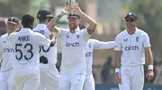 England players celebrate the wicket of a Indian batter.