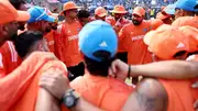 Indian cricket team players in a huddle.