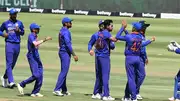 India cricketers snapped while celebrating a wicket.