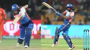 Mumbai Indians' captain Harmanpreet Kaur (C) and her teammate Amelia Kerr run between the wickets during WPL clash against Gujarat Giants. (Getty)