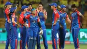 Delhi Capitals players celebrating a wicket. 