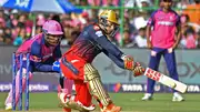 RCB's Anuj Rawat (right) and Rajasthan Royals' Sanju Samson in this frame. (Getty)