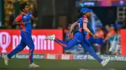 Delhi Capitals' Minnu Mani and Arundhati Reddy (L) run to field the ball during the 2024 WPL. (Getty)