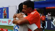 Rahul Dravid embracing Dhruv Jurel.