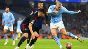 Erling Haaland of Manchester City in action with Kevin Diks of F.C. Copenhagen during the UEFA Champions League. (Getty)