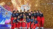 RCB women's team with WPL trophy.