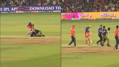 virat kohli grabbed by fan in live match bengaluru stadium Breaches IPL Security watch video