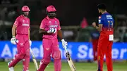 Royal Challengers Bengaluru's Mohammed Siraj (R) celebrates after taking the wicket of Rajasthan Royals' captain Sanju Samson (C) during their IPL 2024 match on April 7. (Getty) 