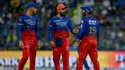 RCB's Virat Kohli talks with his captain Faf du Plessis (L) and teammate Dinesh Karthik (R) during their IPL 2024 clash against SRH on April 15. (Getty)