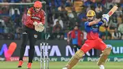 Royal Challengers Bengaluru's Virat Kohli (R) plays a shot during the IPL 2024 clash against SRH on April 15. (Getty)