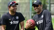 Suresh Raina (L) and MS Dhoni (R). (PC: Getty).