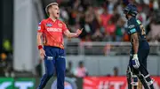 Punjab Kings' captain Sam Curran celebrates after taking the wicket of Gujarat Titans' Sai Sudharsan (R) during their IPL 2024 match on April 26. (Getty)