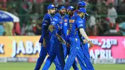 Mumbai Indians captain Hardik Pandya and Rohit Sharma walks off the field with their teammates during an IPL 2024 match. (Getty)