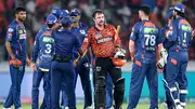 Sunrisers Hyderabad's Travis Head (4R) is congratulated by umpires and Lucknow Super Giants' players for his innings and his team's win at the end of their IPL 2024 clash on May 8, 2024. (Getty)