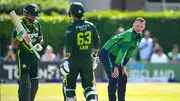 From left: Pakistan's Babar Azam, Saim Ayub and Ireland's Ben White during their 1st T20I at Castle Avenue Cricket Ground in Dublin on May 10. (Getty)