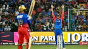 Delhi Capitals' captain Axar Patel (R) gestures during the IPL 2024 clash against Royal Challengers Bengaluru at the M Chinnaswamy Stadium on May 12. (Getty)