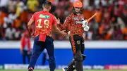 Sunrisers Hyderabad's Abhishek Sharma (R) greets Punjab Kings' Rishi Dhawan (L) during the Indian Premier League (IPL) Twenty20 cricket match between Sunrisers Hyderabad and Punjab Kings at the Rajiv Gandhi International Stadium in Hyderabad on May 19, 2024. (Getty)