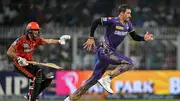 Kolkata Knight Riders' Mitchell Starc (R) runs to field the ball during their IPL 2024 clash and Sunrisers Hyderabad on March 23. (Getty)