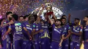 Players of Kolkata Knight Riders celebrate with the trophy after their victory against SRH in the IPL 2024 Final on May 26. (Getty)