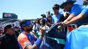 India's Hardik Pandya signs autographs during the T20 World Cup warm-up match against Bangladesh on June 1. (Getty)