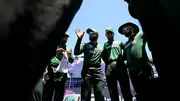 Pakistan skipper Babar Azam speaks to his teammates during their T20 World Cup match against USA  on June 6. (Getty)