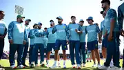 Pakistan's Babar Azam speaks to his teammates in a huddle in this frame. (Getty)