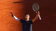 Spain's Carlos Alcaraz celebrates after winning his men's singles semi final match against Italy's Jannik Sinner on Court Philippe-Chatrier on June 7. (Getty)