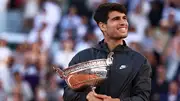 Spain's Carlos Alcaraz celebrates with the French Open 2024 title after winning against Germany's Alexander Zverev at the end of their men's singles final match on June 9. (Getty)