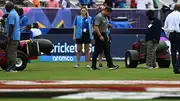 A match official inspects the field during a delay in the start of the ICC men's Twenty20 World Cup 2024 group A cricket match between India and Canada at Central Broward Park & Broward County Stadium in Lauderhill, Florida on June 15. (Getty)