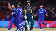 Gulbadin Naib celebrates Glenn Maxwell's wicket with teammates (Getty Images)