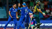 Gulbadin Naib celebrates Glenn Maxwell's wicket with Mohammad Nabi (Getty Images)