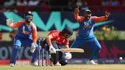 India's Rishabh Pant (L) and Rohit Sharma appeal successfully for the wicket of Sam Curran of England during T20 World Cup final against England on June 27. (Getty)