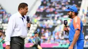 India's Rohit Sharma looks on as he is interviewed by Ravi Shastri during the T20 World Cup match against Ireland on June 5. (Getty)