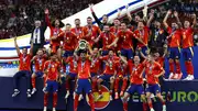 Spanish team celebrate with Euro 2024 trophy 