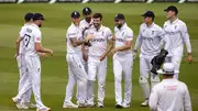 England's Mark Wood (centre) celebrates with his team mates after taking his fifth wicket of the innings during Day 3 of the 3rd Test between England against West Indies on July 28. (Getty)