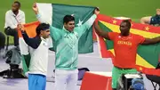 Silver medalist Neeraj Chopra of Team India (left), Gold medalist Arshad Nadeem of Team Pakistan (centre) and Anderson Peters of Team Grenada celebrate after competing in the the Men's Javelin Throw Final at Paris Olympics. (Getty)