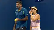 Rohan Bopanna and Aldila Sutjiadi talking during their US Open mixed doubles quarter-final match (Screengrab: X)