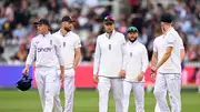 From left: England players Ollie Pope, Chris Woakes, Joe Root, Ben Duckett and Olly Stone leave the field as bad light stops play during the 2nd Test against Sri Lanka at Lord's Cricket Ground on August 31. (Getty)